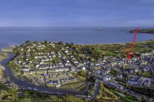 an aerial view of a city with a red arrow at Preswylfa in Abersoch