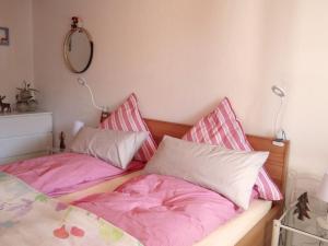 Ένα ή περισσότερα κρεβάτια σε δωμάτιο στο Apartments Amalia - mit WLAN und Sky in traumhafter Lage