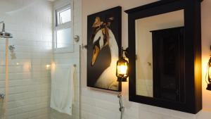 Um banheiro em Vila Pugliesi Hotel Boutique