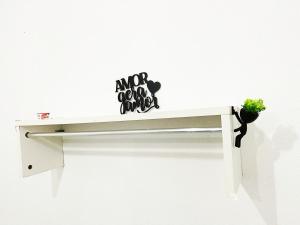 a white desk with a potted plant on it at Aeroporto House 4 in Macapá