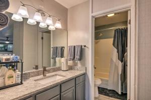 a bathroom with a sink and a mirror at Sweet Skiers Escape Less Than Half-Mile to the Slopes! in Brian Head +19 photos