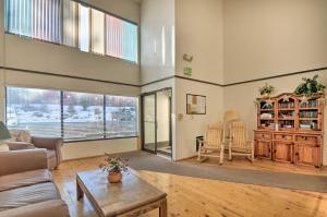 a living room with a couch and a table at Sweet Skiers Escape Less Than Half-Mile to the Slopes! in Brian Head