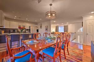 a dining room and kitchen with a table and chairs at Poconos Retreat Resort Perks, Lake Access! in Pocono Summit