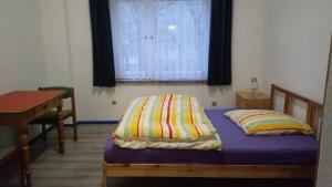 Postel nebo postele na pokoji v ubytování LINDENHOF WALDHEIM