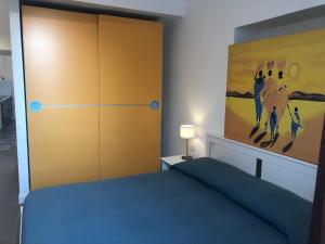 A bed or beds in a room at La Maison Della Torre