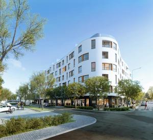 a rendering of a white building on a street at Luksusowy penthouse z jacuzzi i widokiem na morze in Gdynia