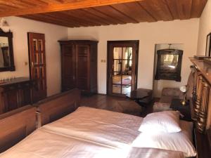 Postel nebo postele na pokoji v ubytování Apartmány pod věží