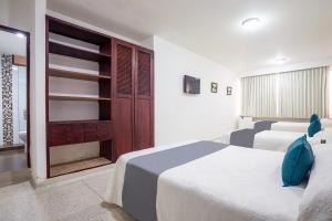 Ayenda Hotel Carivdi客房内的一张或多张床位