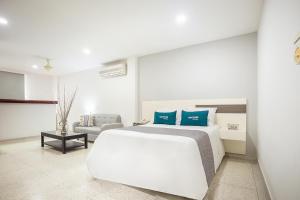 Ayenda Hotel Carivdi客房内的一张或多张床位