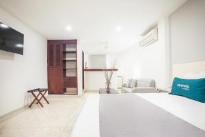 Ayenda Hotel Carivdi客房内的一张或多张床位