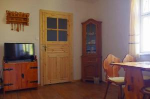 TV a/nebo společenská místnost v ubytování Vopařilův statek Leština