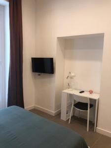 A television and/or entertainment centre at La Maison Della Torre