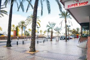 Supermarket nebo jiné obchody v  apartmánu nebo okolí