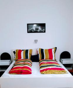Postel nebo postele na pokoji v ubytování Pécs Park
