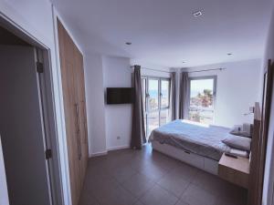 Postel nebo postele na pokoji v ubytování Panoramic sea view apartment