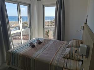 Postel nebo postele na pokoji v ubytování Panoramic sea view apartment