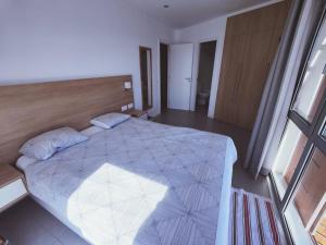 Postel nebo postele na pokoji v ubytování Panoramic sea view apartment