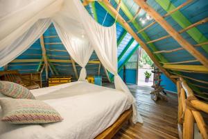 Postel nebo postele na pokoji v ubytování Hotel Casa Coson