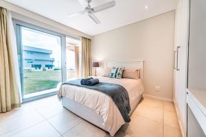 Katil atau katil-katil dalam bilik di 101 Bermuda-Luxury with magnificent ocean views +28 gambar