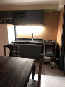 A cozinha ou cozinha compacta de Varandas para o Atlântico. Frente mar!