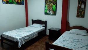 Hostal Selvatrip客房内的一张或多张床位