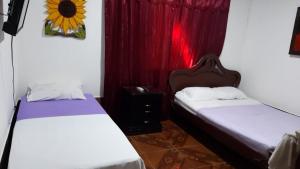 Hostal Selvatrip客房内的一张或多张床位