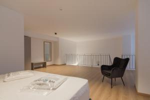 Leochares Lifestyle Apartments - Self check-in客房内的一张或多张床位