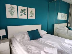 Posteľ alebo postele v izbe v ubytovaní Lovely Apartment vis-a-vis Medicover and Paley Institute