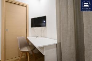 TV a/nebo společenská místnost v ubytování Area Sud