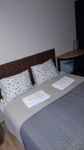 Кровать или кровати в номере Apartman Balna