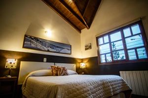 Cama ou camas em um quarto em Las Avutardas Hosteria