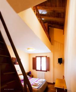 Postel nebo postele na pokoji v ubytování Hostal Musunzar