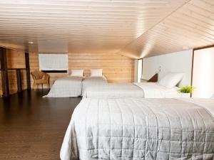 Postel nebo postele na pokoji v ubytování Villa Halla - 8 henkilölle, HimosYkkösen alue, 76m²+36m² + 26 fotografií