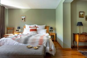 Postel nebo postele na pokoji v ubytování Boutique Hotel Bellevue Lermoos