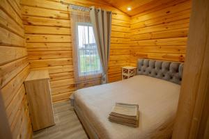Ένα ή περισσότερα κρεβάτια σε δωμάτιο στο Vastapo Vilos +66 φωτογραφίες
