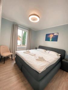 Ein Bett oder Betten in einem Zimmer der Unterkunft Villa Seebach