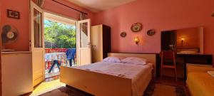Posteľ alebo postele v izbe v ubytovaní Rooms Ante