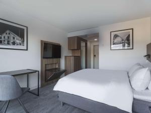 Postel nebo postele na pokoji v ubytování Radisson Blu Hotel Tromsø