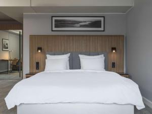 Postel nebo postele na pokoji v ubytování Radisson Blu Hotel Tromsø