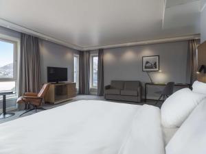 Postel nebo postele na pokoji v ubytování Radisson Blu Hotel Tromsø