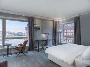 Postel nebo postele na pokoji v ubytování Radisson Blu Hotel Tromsø
