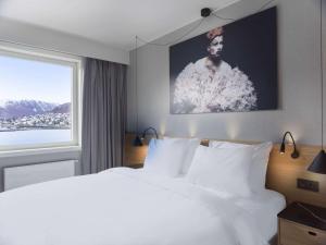 Postel nebo postele na pokoji v ubytování Radisson Blu Hotel Tromsø