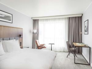 Postel nebo postele na pokoji v ubytování Radisson Blu Hotel Tromsø