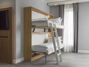 Postel nebo postele na pokoji v ubytování Radisson Blu Hotel Tromsø
