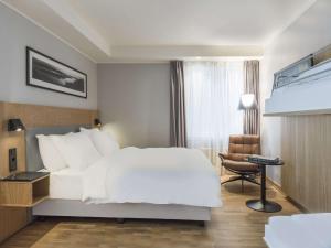 Postel nebo postele na pokoji v ubytování Radisson Blu Hotel Tromsø