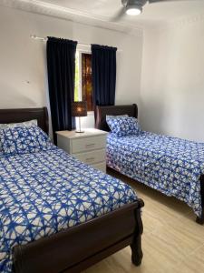 Llit o llits en una habitació de Villa Amatista