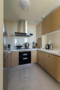 Cucina o angolo cottura di Guanlan Pavilion Seaview Homestay
