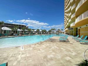 The swimming pool at or close to Calypso 3-2303 Penthouse Level w/ Incredible View!