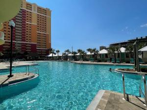 The swimming pool at or close to Calypso 3-2303 Penthouse Level w/ Incredible View!
