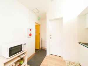 TV a/nebo společenská místnost v ubytování Kevin's Place II (Annex)